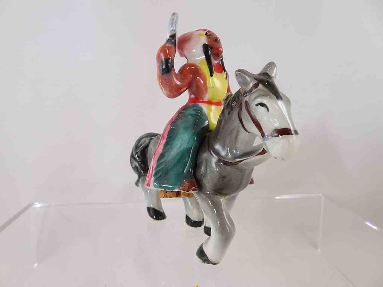 Native American Indian male on horse salt and pepper shakers